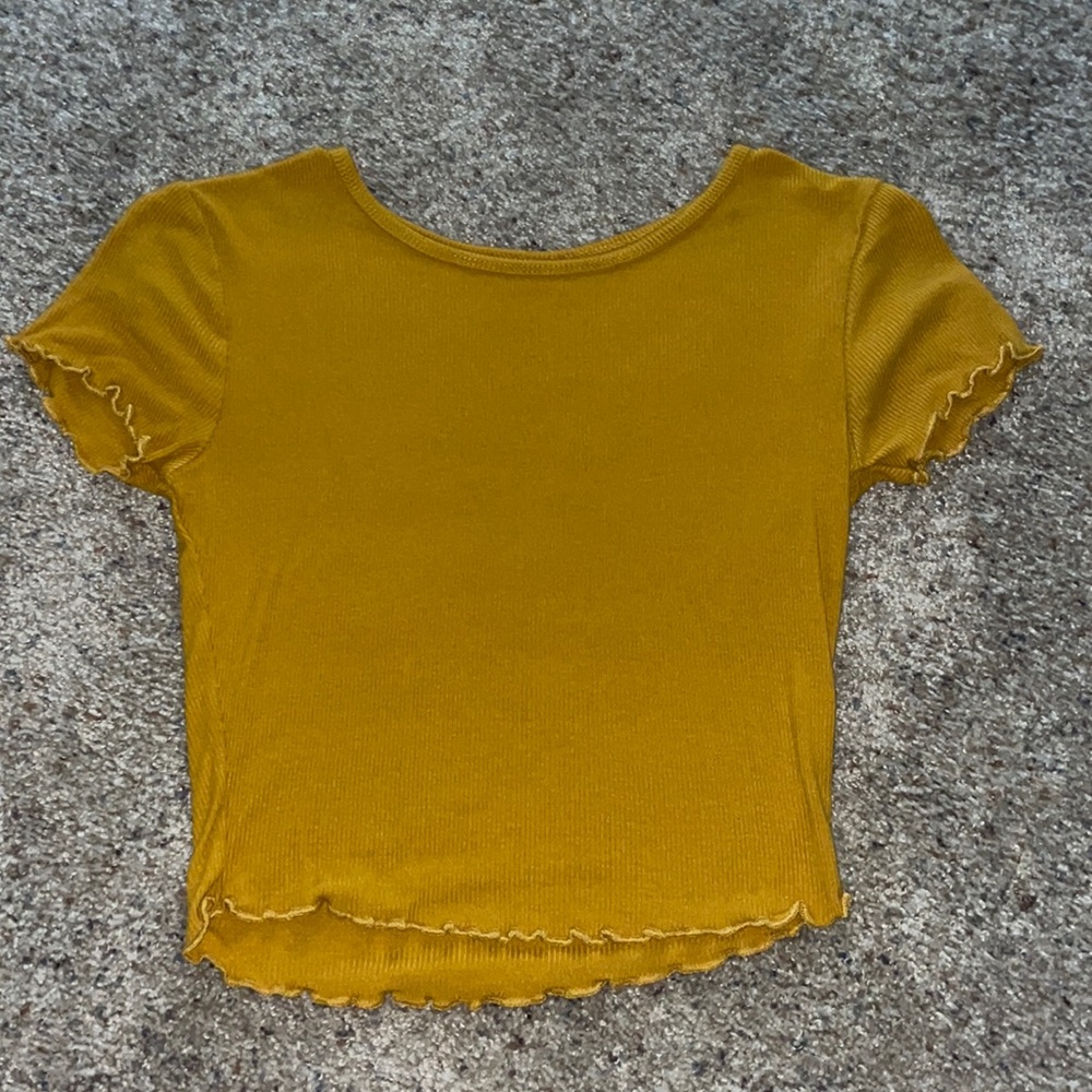cropped yellow shirt. got it from tillys and only wore it twice:)